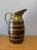 Substantial in both scale and presence, this very large 19th century coopered wine or cider jug is a striking example of...