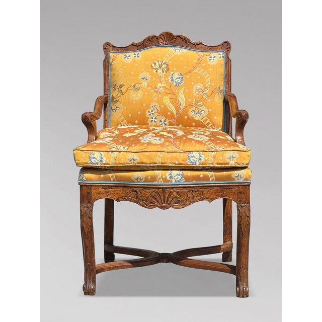 Charming 18th Century French Walnut Armchair Newly Upholstered in Pierre Frey Fabric A very fine 18th-century French...