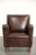 This sturdy vintage sheepskin armchair is compact in size, features a beautiful, timeless English design, and has a lovely...