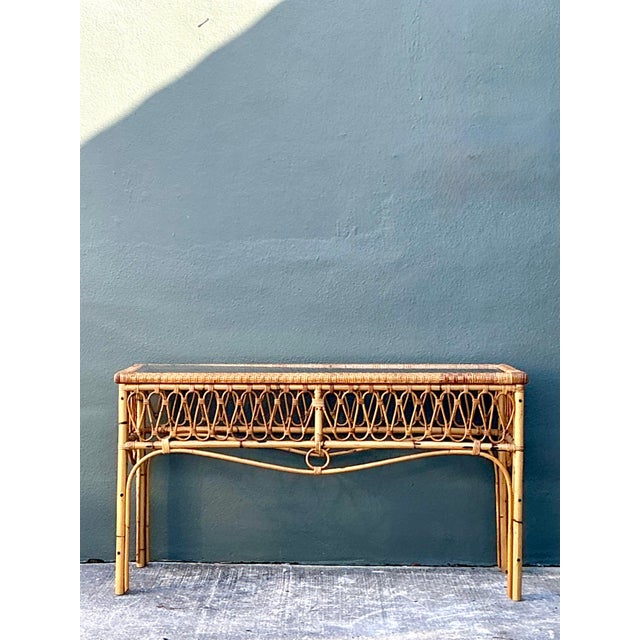 This exquisite vintage console table is a masterful expression of 1970s Italian design, blending the breezy allure of Palm...