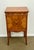 Beautifully made satinwood and cherry side / drink table with book matched veneers on the top and doors decorated with...