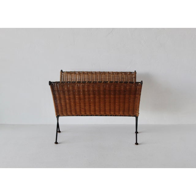 Fabulous compact Scandinavian Style Mid Century Modern Folding Hand-Woven Rattan Magazine Rack With Metal Legs. In good...