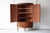 A beautiful rosewood bow-front corner cabinet, made in the 1950s by L. Chr. Larsen & Søn, and attributed to Danish...