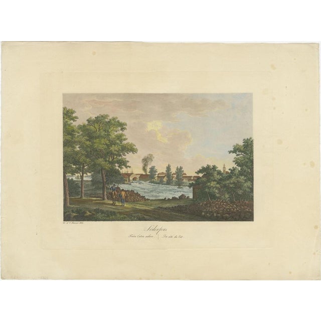 This original antique aquatint is a picturesque depiction of Söderfors, a place likely to be in Sweden, given the naming...