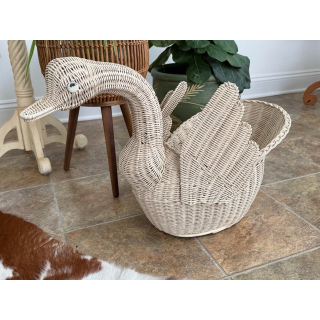 Beautiful large goose or swan form basket in a creamy-white wicker body with upswept wings. Charming Coastal touch. Please...