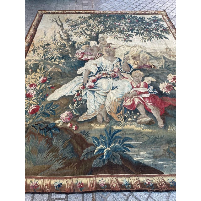 Beautiful 17th-century Flemish tapestry fragment, handwoven in wool, silk highlights, depicting an elegant mythological or...
