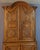 Eighteenth-century two-part oak buffet. This buffet opens with four doors, the cornice of the upper section is curved, and...