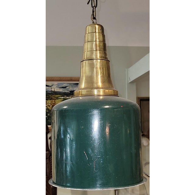 Industrial chic with this 1920s brass and painted hanging lamp from France. Single bulb of any wattage dangling on a long...