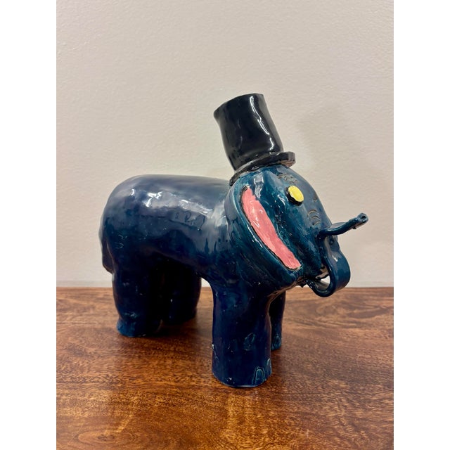 Charming vintage American studio pottery elephant sculpture with a wonderfully naive, hand-built folk art character....