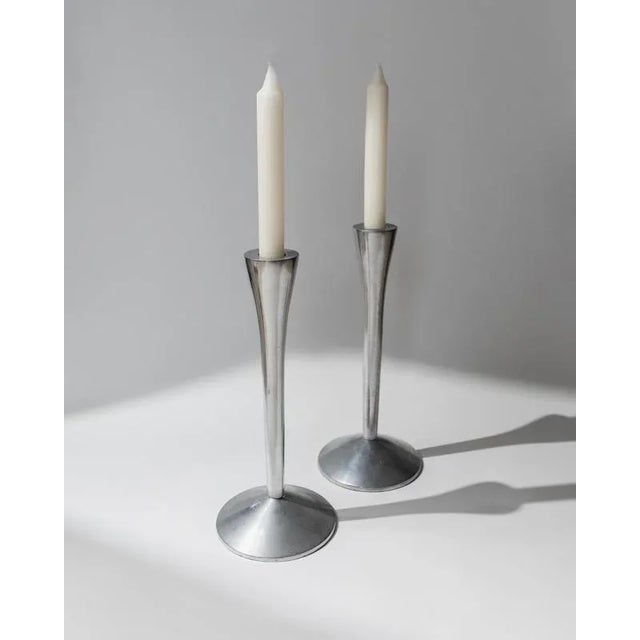 This stylish set of 2 vintage candle holders from 1970s Italy reflects the bold elegance of Space Age design. Crafted from...