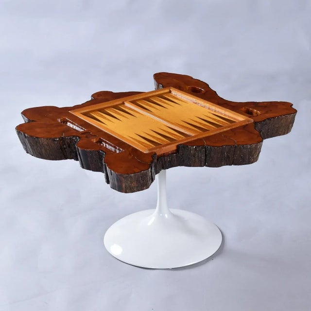 Vintage live edge wood, reversible chess and backgammon gaming table. A reversible game board is inset to the slab. One...