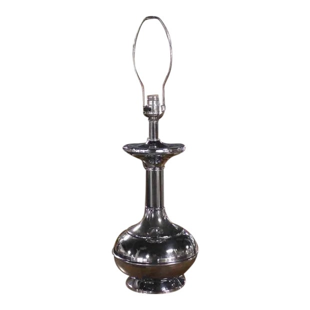 Turn vase shape chrome base Mid-Century Modern table lamp. Mirror like polished finish.
