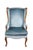 Vintage Queen Anne Style Wingback Chair. Features a distressed wood frame and blue velvet upholstery. The wingback chair...
