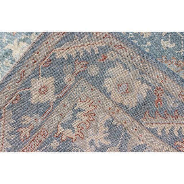Turkish Oushak Rug With Floral Design in Light Steel Blue and Coral Accent For Sale - Image 11 of 12
