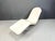 Mid century chaise longue made from a fiberglass shell mounted on a white metal frame. Beautifully weathered chair which...
