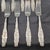 This Art Nouveau antique 1885 "Lily of the Valley" sterling silver luncheon fork set by Whiting Manufacturing Company is a...
