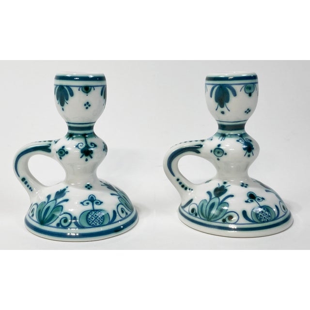 Vintage pair of Royal Delft De Porceleyne Fles Delvert green and white candlestick holders. Detailed with two shades of...