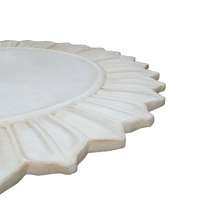 A hand-carved marble platter, server or charger from India. 24 inches in diameter, 0.75 inches tall. An elegant piece to...