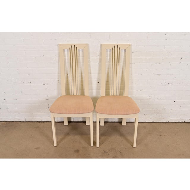 A sleek and stylish pair of Italian Modern or Postmodern slatted high back side chairs or dining chairs In the manner of...