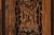 This antique Chinese four-panel screen is composed of individually carved wooden panels, each featuring a finely pierced...