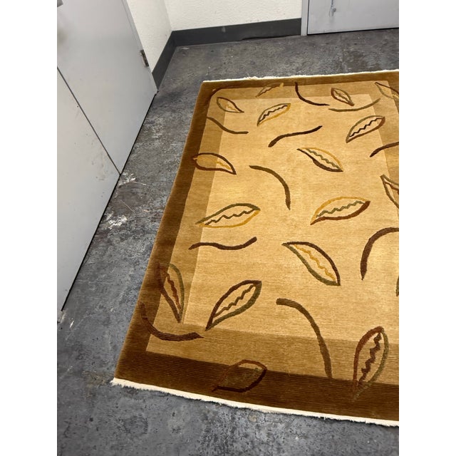 Design Plus Gallery presents a 5ftt × 7ft 6in Wool Are Rug from Tony Kitz Gallery. This handwoven wool rug presents a...