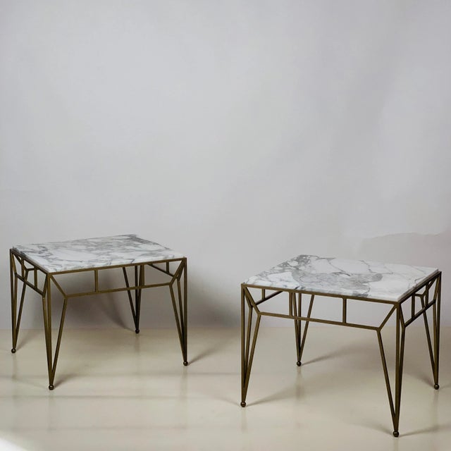 Pair of large marble side tables.