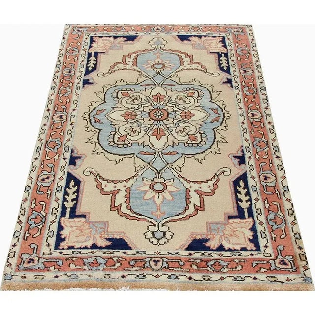 ACTUAL SIZE: 2’9″ x 5’7″ PRIMARY COLOR: Beige / Rose AGE: Old MATERIALS: Wool FOUNDATION: Cotton PRODUCTION: Handwoven,...