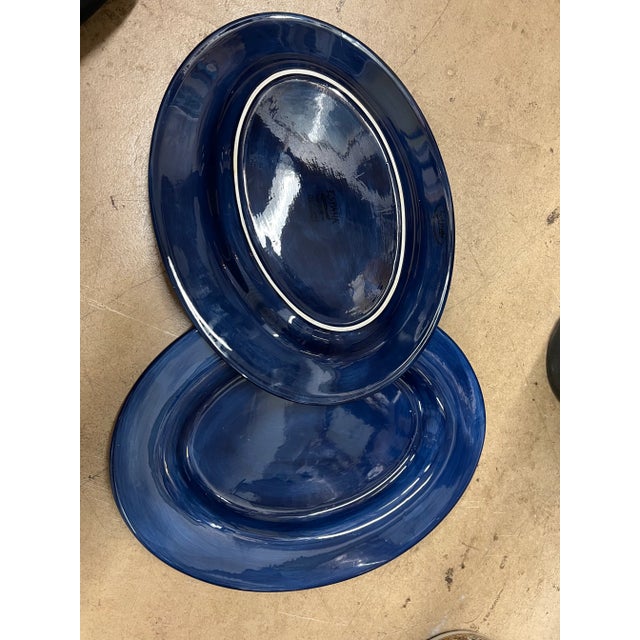 Vintage handmade and painted large serving oval platters. Vibrant cobalt blue . Marked on the bottom Made by ESPANA. Set...
