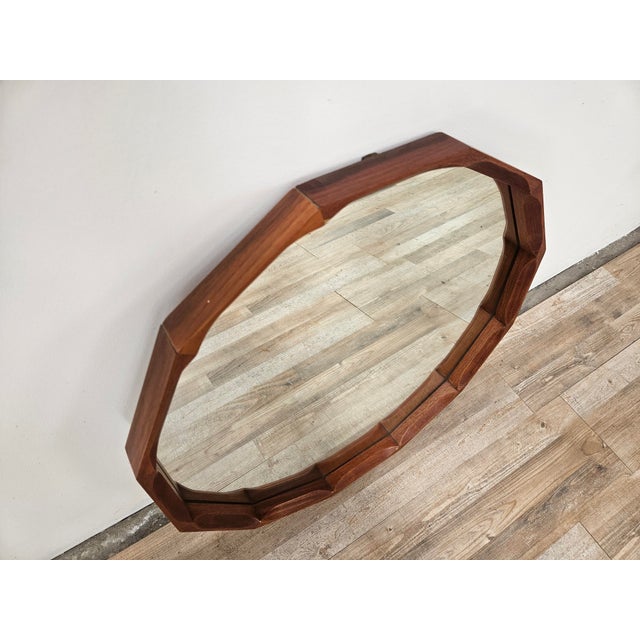 Dodecagonal mirror designed by Dino Cavalli and produced by Tredici in the 1960s. Wood frame and original period mirror....