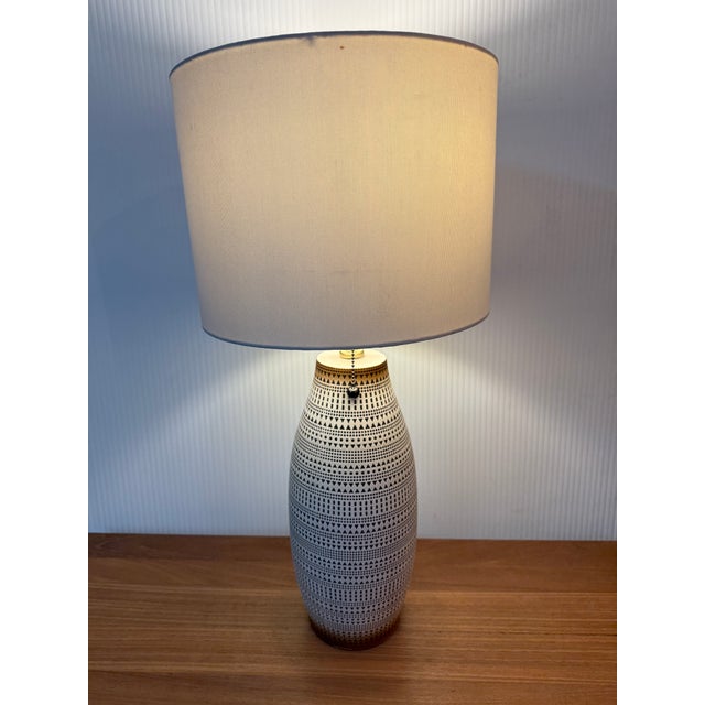 Design Plus Gallery presents the Kele Table Lamp from Union Rustic. The two-tone lamp is crafted with precision from...