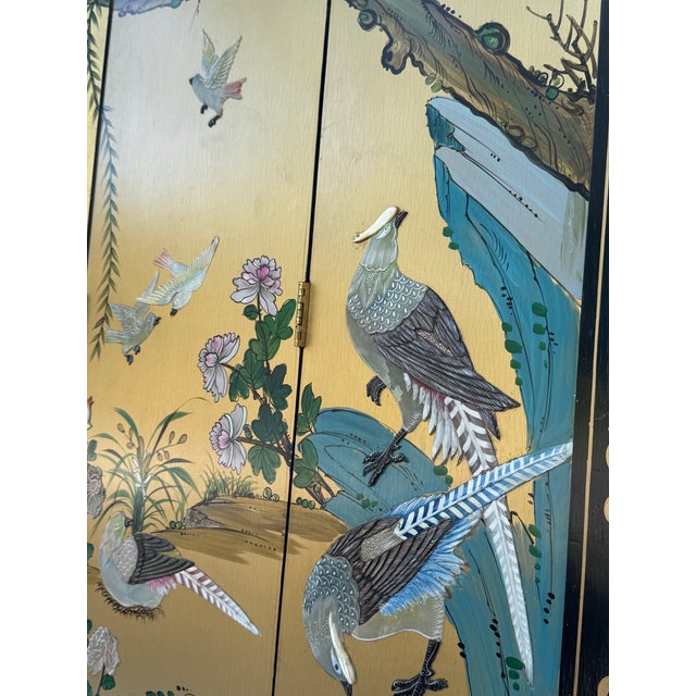 An exceptional vintage Chinese four-panel Chinoiserie folding screen showcasing exquisite craftsmanship and timeless...