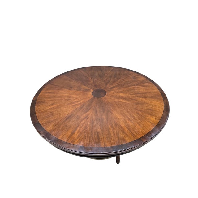 Mid-Century Modern Walnut Round Extension Dining Table with Sunburst Top & Brass Stretcher Base A beautifully crafted...