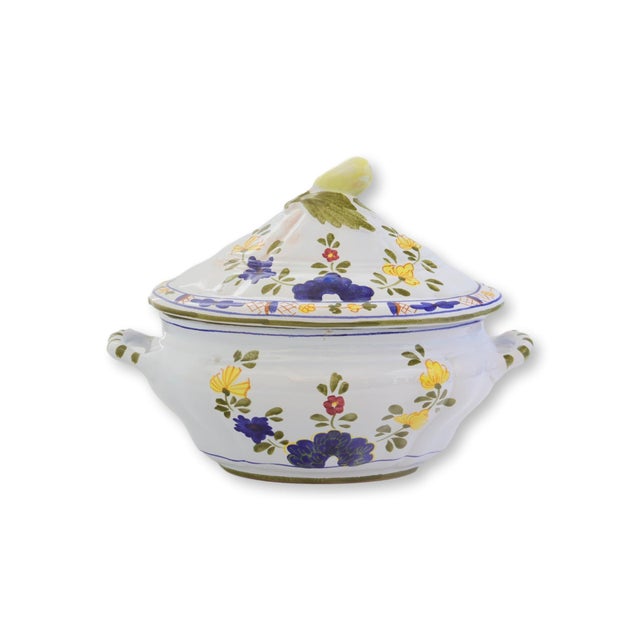 A striking Italian majolica tureen by Cantagalli, hand-painted in a rich palette of cobalt blue, golden yellow, olive...