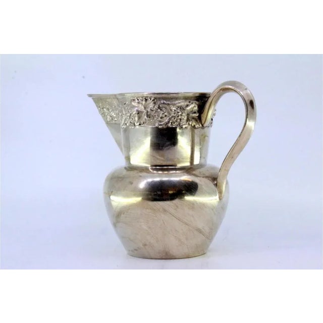 Silver Wine Jug with Reliefs and Applications of Leaves and Grapes For Sale - Image 4 of 6
