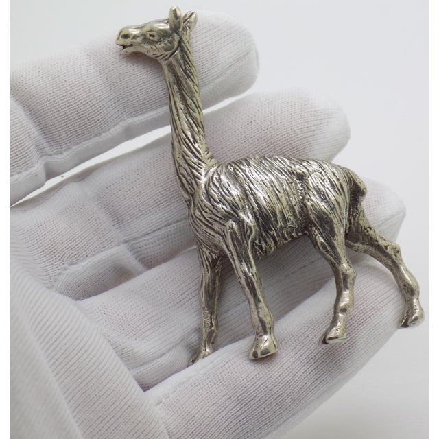 This vintage Italian silver llama figurine, crafted during the 1960s/1970s, showcases detailed craftsmanship that...