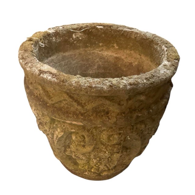 A striking pair of vintage garden planters showcasing a beautifully weathered patina and strong, rustic proportions. Each...