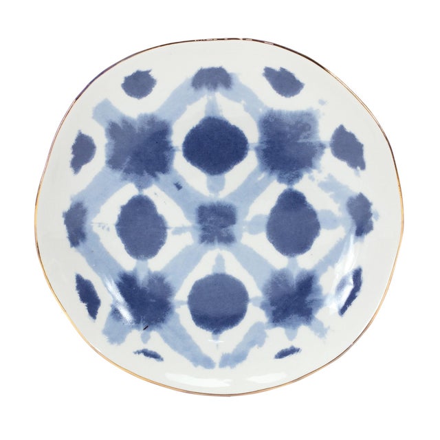 Bring seaside charm to your table with this set of four Coastal Tie-Dye Ceramic Plates. Designed in soothing blue and...