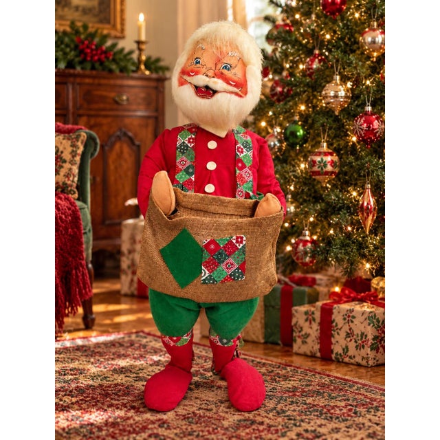 Bring a cheerful, nostalgic touch to your Christmas décor with this large Annalee Santa Claus figure, measuring...
