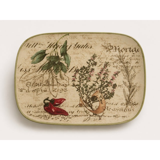 Bring the warmth of an Italian country kitchen to your table with this set of two coordinating hand painted Ceramisia...