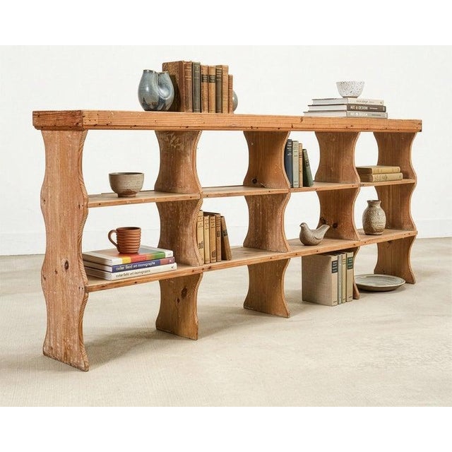 A rustic large 19th century pine cupboard shelf or étagère hand-crafted in France out of pine. The shelves are constructed...