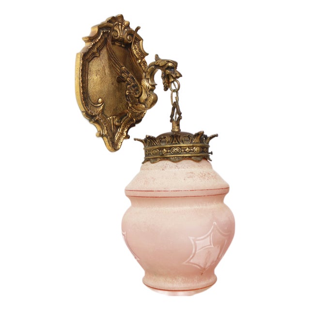 Antique Gothic Revival Bronze Dragon or Griffin Wall Sconce with Pink Glass Shade, Early 20th Century For Sale