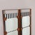 Tall Italian Modern Mirror. Walnut with black and white vertically striped fabric panel with three mirrors mounted on top...
