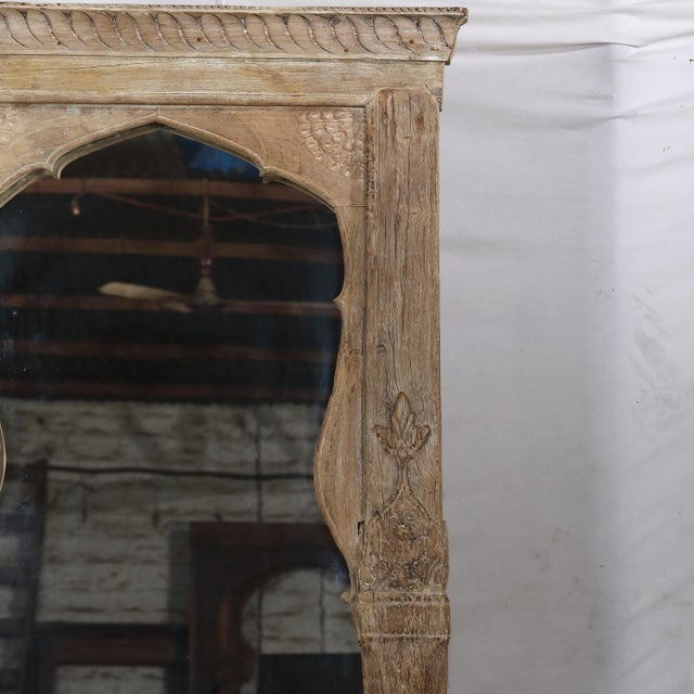 Antique Indian Bleached Teakwood Archway with a Mirror on Iron Legs, now a one of a kind standing mirror. The archway, c....