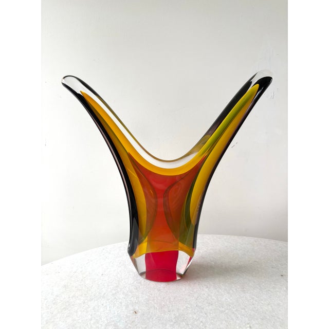 Joe Nielander double mouth glass sculpture. 2003, thick cased blown glass in red, yellow and black lip wraps, unusual...