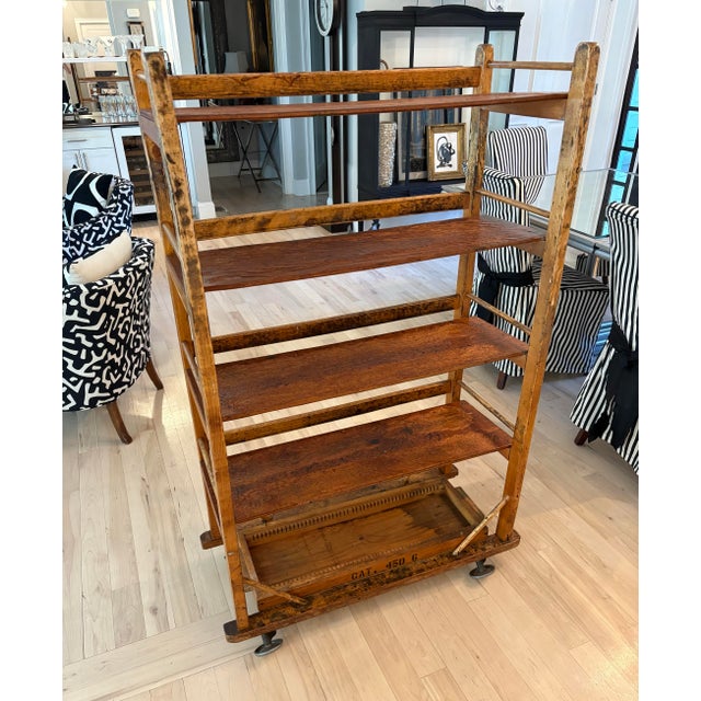 A remarkable survivor from Massachusetts’ rich shoe-manufacturing history, this authentic factory rolling shoe rack once...