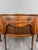 An elegant 19th-century mahogany and mahogany veneer half-moon buffet. Its distinctive half-moon shape beautifully...