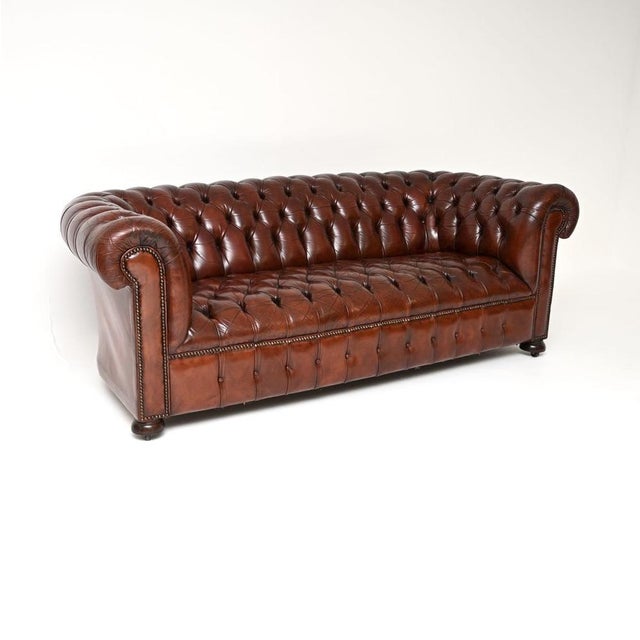 A smart and very well made antique deep buttoned leather Chesterfield sofa. This was made in England, it dates from around...