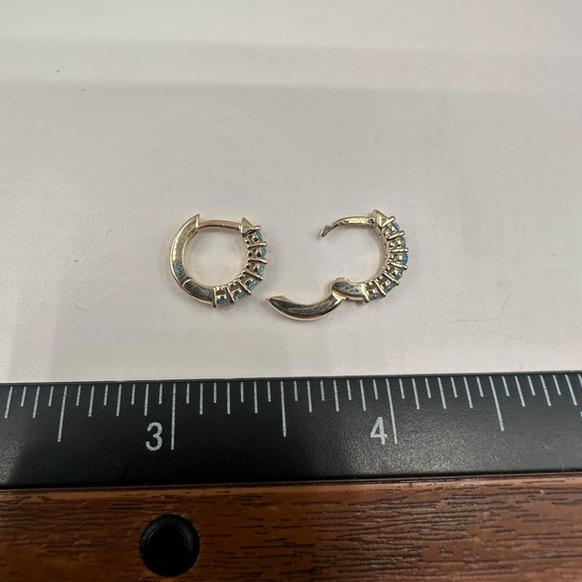 Early 21st Century Blue Topaz Huggies in 10kt Yellow Gold - 12 Topaz Stones, 12.2mm, 1.9g, New, A Pair For Sale - Image 5 of 5