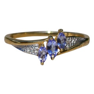 The Aubrieta: Ladies Simple Yellow Gold Tanzanite and Diamond Ring For Sale
