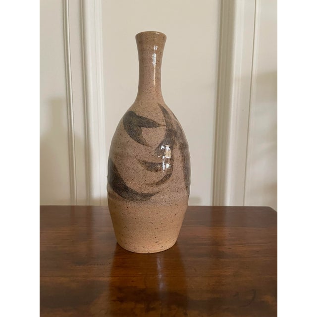 The potters hand has created this classic style vase with the graduation of colors ranging from blush tone at the top...